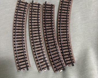 Marklin 6100 curve track section. 4 pieces.