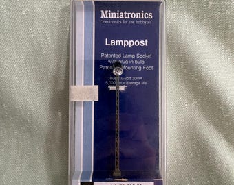 Miniatronics model #72-618-01 yard spot light. Single searchlight
