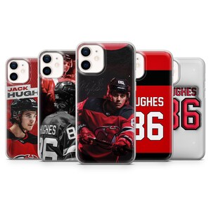 May include: Five phone cases showcasing hockey player Jack Hughes. The cases feature images of Hughes in his hockey uniform, with the number 86. The cases are red, black, and white.