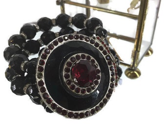 Chunky Black Glass Bead  3-Strand Bracelet with Fabulous Circular Silver Black and Red Focal Point Clasp  7-5/8” Long  2” Wide