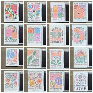 May include: A collection of floral-themed magnets with inspirational quotes. Each magnet features a unique flower design in pastel colors, with text such as "Be Still & Know" and "Love". The magnets are rectangular with a black border, perfect for decorating a refrigerator or metal surface.
