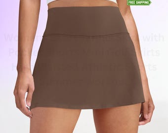 Saia-calça feminina de cintura alta para tênis com bolsos, ideal para golfe e exercícios.