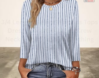Blusa feminina casual de manga 3/4, gola redonda, modelagem solta e moderna.