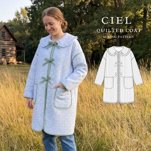 May include: A light blue quilted coat with a white bow pattern, a rounded collar, and three green ribbon ties down the front. The coat features two patch pockets with green trim. A technical line drawing of the coat is displayed on the right.