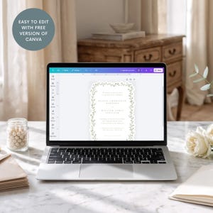 Puede incluir: Un port&aacute;til plateado muestra una plantilla de invitaci&oacute;n de boda con un borde de enredadera verde. El texto en la pantalla dice Olivia Charlotte Ashford y William James Sinclair. Una insignia circular indica Easy to edit with free version of Canva.