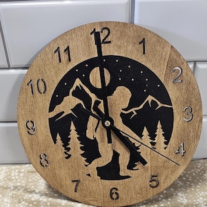 Wooden wall clock featuring Bigfoot.