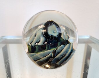 Solid glass press paper 8x5x5 cm with 3D engraved shepherd with sheep over the shoulders
