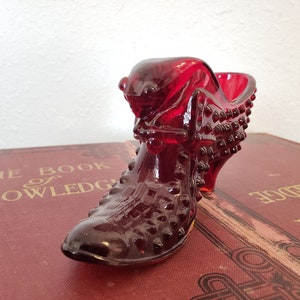 Red glass best sale slippers