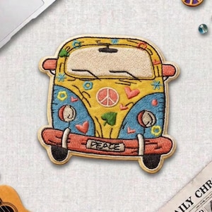 May include: Embroidered patch featuring a yellow and blue vintage van with a peace sign and the word "PEACE". The patch has a retro design with hearts and flowers. The patch is approximately 3 inches wide and 2.5 inches tall.