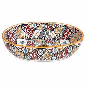 Peut inclure: Lavabo ovale en céramique avec un motif vibrant et complexe. Le lavabo présente une base blanche ornée de motifs géométriques rouges, bleus et jaunes. Un bord et un drain dorés complètent ce bassin décoratif, adapté à une salle de bain.