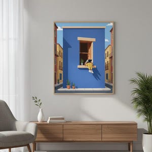 May include: A framed art print depicts a person sitting in a window, working on a laptop. The building is painted blue, with yellow and red buildings on either side. The person wears yellow pants and the scene is set in a sunny, outdoor environment.