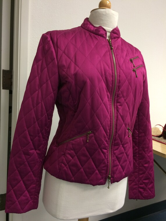Express quilted jacket has lots of Zippers