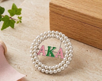 También conocido como broche de perlas