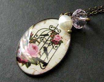 Pink Floral Birdcage Necklace in Bronze with Pink Crystal Charm and Fresh Water Pearl. Handmade Jewelry.