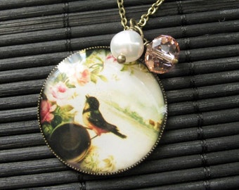 Singing Bird Charm Necklace in Bronze with Pink Crystal and Genuine Pearl Charm. Handmade Jewelry.