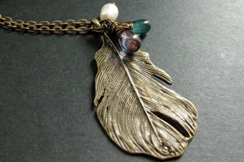 Feather Necklace. Bronze Charm Necklace in Teal, Purple and Fresh Water Pearl. Handmade Jewellery. image 1