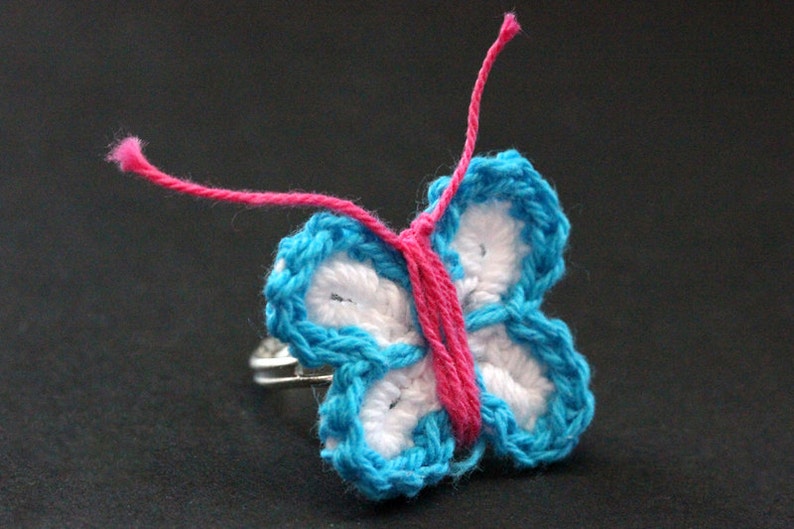 Crochet Butterfly Ring in Blue, White and Fuchsia . Silver Adjustable Ring. Handmade Jewelry. image 1