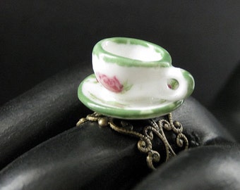 Porcelain Teacup Ring with Green Trim and Pink Flowers. Bronze Filigree Adjustable Ring. Handmade Jewelry.