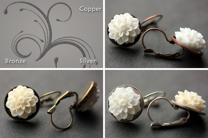 May include: A set of three pairs of earrings with white flower-shaped charms. The earrings are available in silver, bronze, and copper.