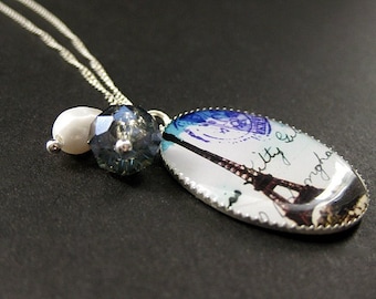 Paris Daydream Charm Necklace with Blue Crystal and Fresh Water Pearl Charms. Handmade Jewelry.