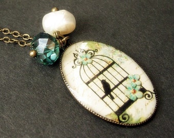 Birdcage Necklace in Cream with Teal Crystal Charm and Fresh Water Pearl. Handmade Jewelry.