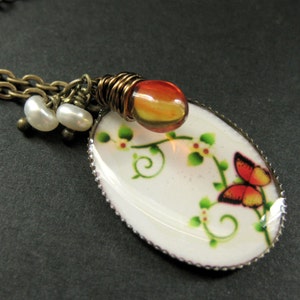 Fire Butterfly Necklace. Butterfly Pendant with Fiery Teardrop and Fresh Water Pearl. Handmade Jewellery. image 3
