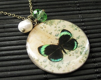 Green Butterfly Charm Necklace in Bronze with Genuine Pearl Charm and Green Crystal. Handmade Jewelry.