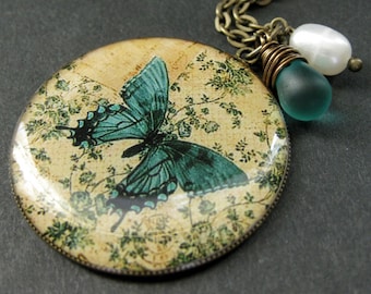 Teal Butterfly Necklace. Butterfly Pendant Necklace with Wire Wrapped Teal Teardrop and Pearl. Handmade Jewelry.