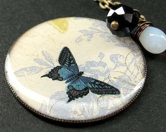 Cadet Blue Butterfly Necklace. Charm Necklace with Midnight Blue Crystal and Wire Wrapped Teardrop. Handmade Jewelry.