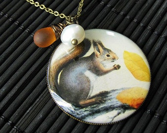 Gray Squirrel Charm Necklace in Bronze with Frosted Honey Glass Wire Wrapped Teardrop and Pearl. Handmade Jewelry.