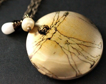 Leonardo DaVinci Locket Necklace. Vitruvian Man Necklace. Leonardo DaVinci Locket with White Coral Teardrop and Pearl. Handmade Jewelry.