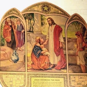 May include: A vintage religious print depicting a biblical scene. The artwork features figures in robes, with Jesus interacting with others. The print has a decorative border and includes text at the bottom. The color palette includes earth tones and reds.