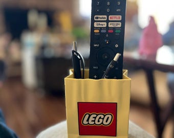 Akcesorium na biurko: Torba na zakupy LEGO, pojemnik na długopisy i uchwyt na kontroler