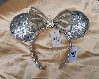Tiara com orelhas de castelo da Minnie Mouse prateada e champanhe