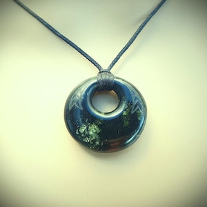 New Zealand Greenstone or Pounamu Circle of life pendant with Maori koru engraving