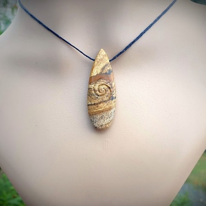 Picture Jasper Hand carved with Koru galaxy engraving.