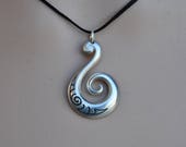 New Zealand Maori Koru sterling silver pendant on black adjustable cord. Solid Sterling Silver jewelry.