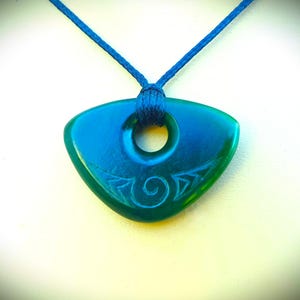 New Zealand Greenstone or Pounamu Circle of life pendant with Maori koru engraving
