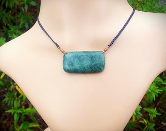 New Zealand Greenstone or Pounamu Kete with copper binding. Hand carved with Maori koru engraving