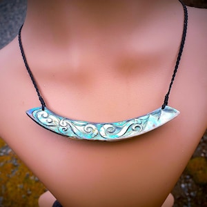 Manaia guardian pendant~ Mountains to the Sea. New Zealand Paua Shell Hand carved pendant
