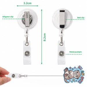 May include: Clear plastic retractable badge holder with an alligator clip and belt clip. The badge holder is 3.2 cm wide and 8.2 cm long. Includes a metal pushpin and a small otter graphic that says "I AM AN OTTER".