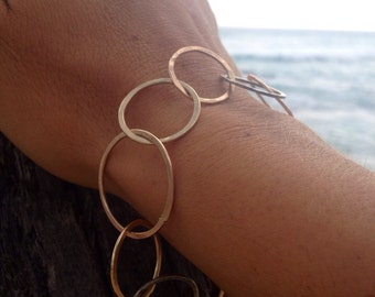 Circles around you bracelet--handmade gold filled, rose gold filled, & sterling silver circles soldered together