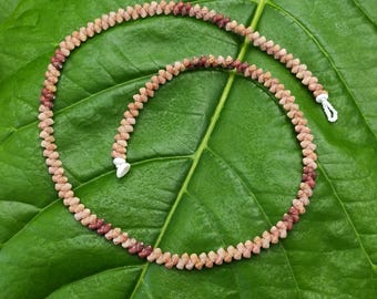 Kahelelani Shell Lei: Kahelelani Shells, Puka Shells, 50lb Nylon String, Puka Shell Clasp, Single Strand Lei