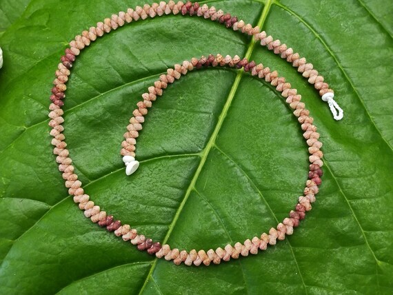 Kahelelani Shell Lei: Kahelelani Shells, Puka Shells, 50lb Nylon String, Puka Shell Clasp, Single Strand Lei