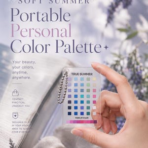 May include: A clear rectangular plastic card featuring a grid of small colored squares labeled TRUE SUMMER and MAKE UP COLOR. The card includes a silver metal ball chain attached to the top corner for portability, displaying various shades.