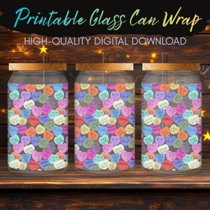 May include: Three glass can wraps with wooden lids are displayed. The wraps feature a colorful pattern of conversation hearts with phrases like "I love you" and "Be Mine." The text "Printable Glass Can Wrap" is at the top.