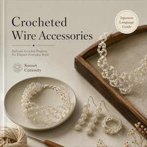 May include: A book titled Crocheted Wire Accessories with a subtitle Delicate Crochet Projects for Elegant Everyday Style and a Sunset Curiosity logo. The cover displays a silver wire crochet bracelet, necklace, earrings, and ring with pearls.