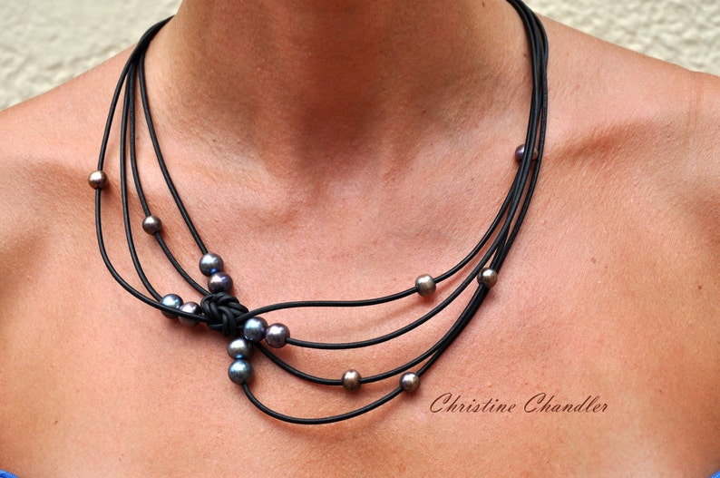 Pearl and Leather Jewelry Necklace Black Peacock Reef Knot Necklace Pearl and Leather Jewelry Collection image 1