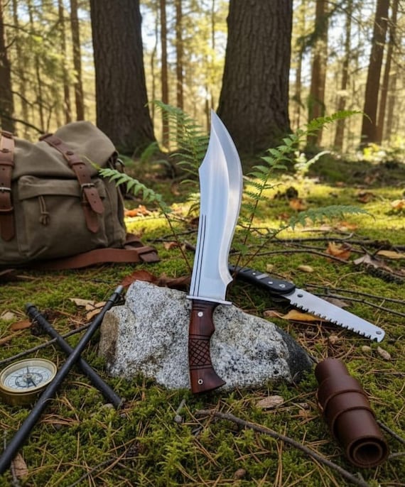A blacksmith actually hammered this full-tang tracker blade out of high-carbon steel — comes battle-ready with a leather sheath and ferro rod, not a factory in sight.