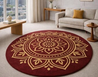 May include: A round, burgundy rug with a gold floral mandala design. The rug is centered in a living room with a neutral color scheme, a sofa, and a city view through a large window. The text "CozyCarpets" is visible.